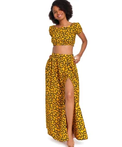 African two-piece set in wax fabric with macaroni print in yellow tones and vibrant design.