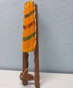 Golden Kente African Fan made from authentic 100% African wax cotton fabric, featuring a pattern inspired by Kente fabric, a wooden handle, and leather details.<br/><br/><br/>