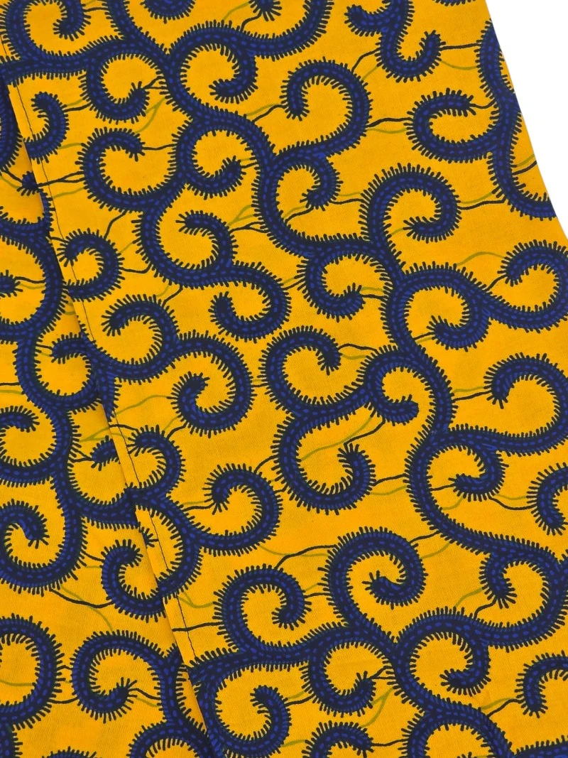 Pañuelo Africano Espirales Doradas Pañuelo Africano Espirales Doradas de algodón con estampado en espiral