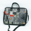 Carry your laptop safely and stylishly thanks to our African bags.